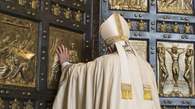 Pope Francis opening the Holy Door of St Peter's Basilica for the extraordinary Jubilee of 2015. Photo Credit: Vatican Media