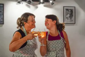Clinking glasses on a Private Spritz & Spaghetti Class
