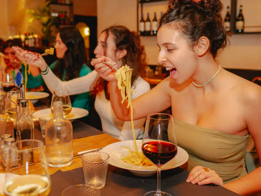 Tour group enjoying a meal in Trastevere