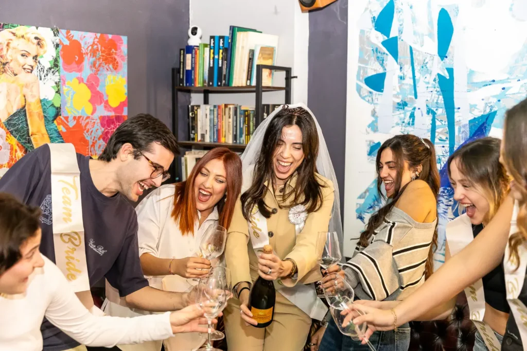 Group of people enjoying cooking class experience with food and drinks at Rome Tipsy Tour