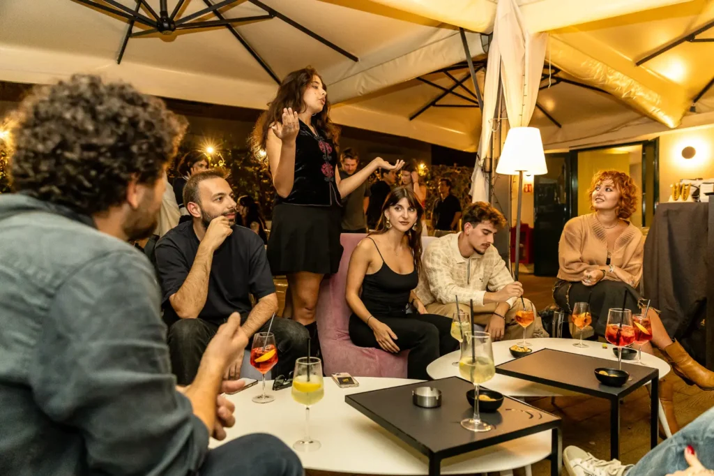 Group of travelers dining together in warm restaurant setting during Rome Tipsy Tour