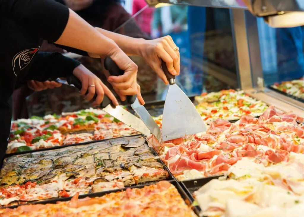Freshly baked Roman pizza with toppings